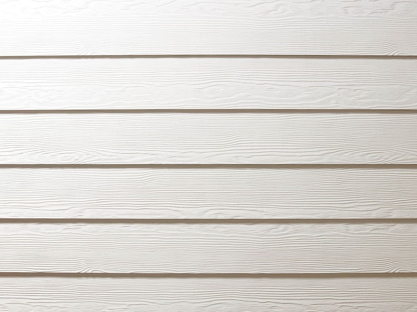 Close-up of Allura Lap Siding in Traditional texture, Snow colour.