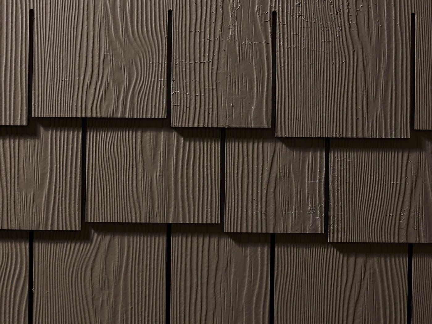Close-up of Allura Multishake staggered-edge shake siding in Sable Brown.