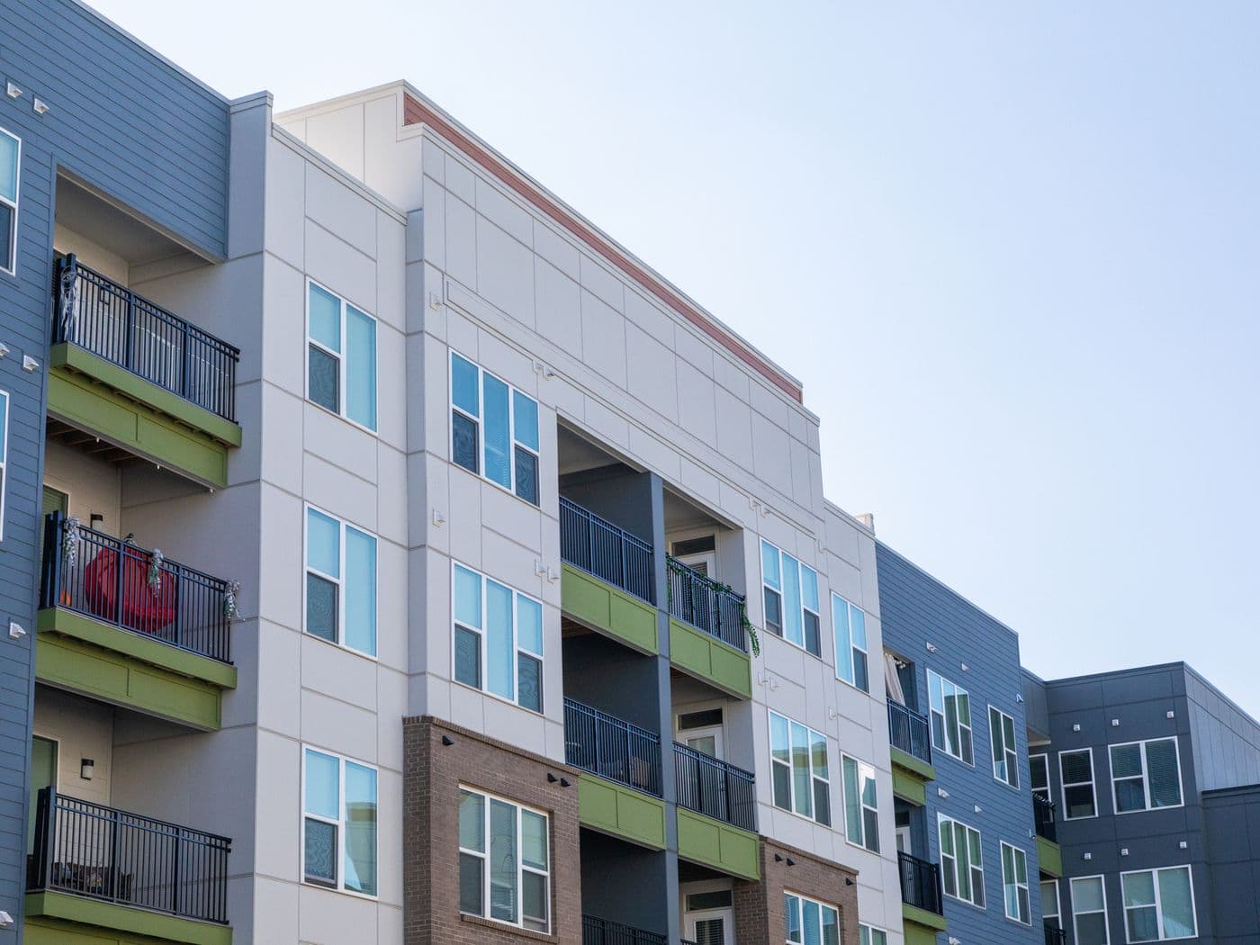 Multi-family building exterior finished with Allura fibre cement panels.