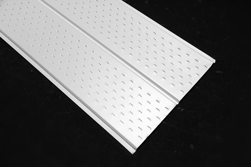 White centre-vented aluminum soffit panel photographed on a dark background.