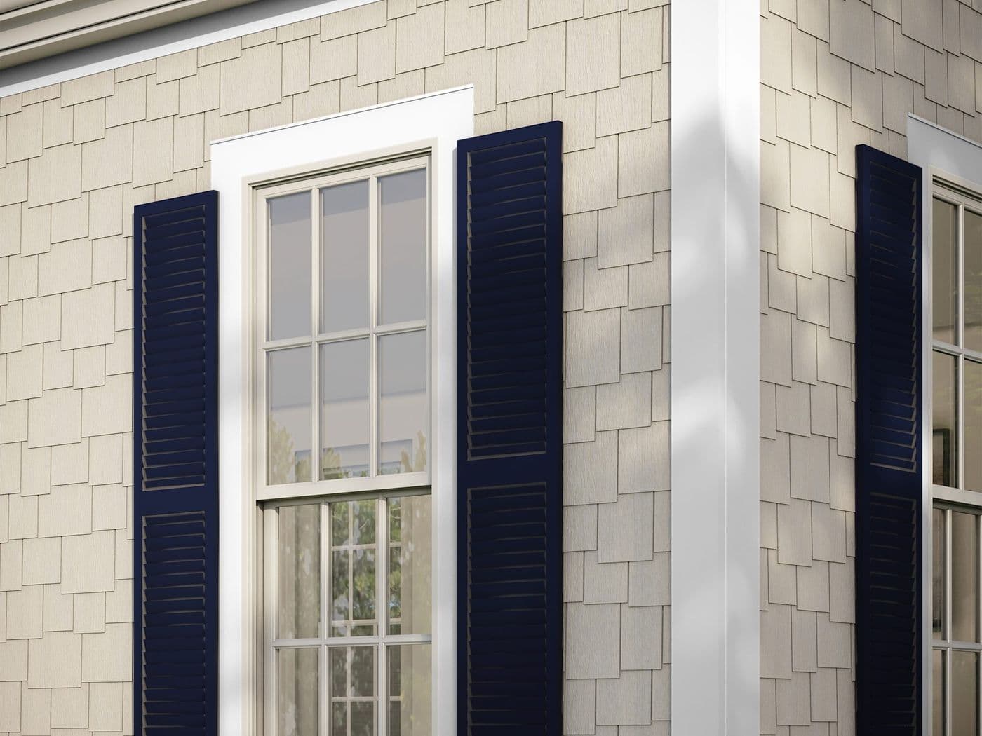 Rendering of a home corner and window trimmed in white HardieTrim boards against shake-texture Hardie siding.